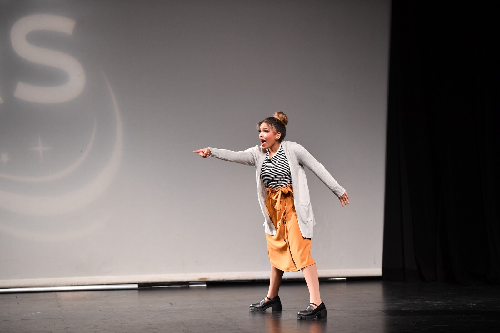 Ciara Rayne pointing during a stage performance